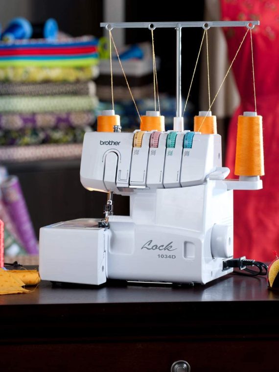1034D Serger, Heavy-Duty Metal Frame Overlock Machine, 1,300 Stitches Per Minute, Removeable Trim Trap, 3 Included Accessory Feet