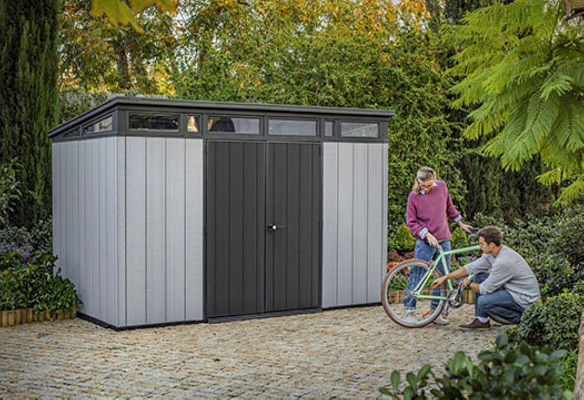 Keter Artisan 11x7 Modern Resin Outdoor Storage Shed Kit-Perfect to Store Patio Furniture, Garden Tools Bike Accessories, Beach Chairs and Lawn Mower, Grey & Black