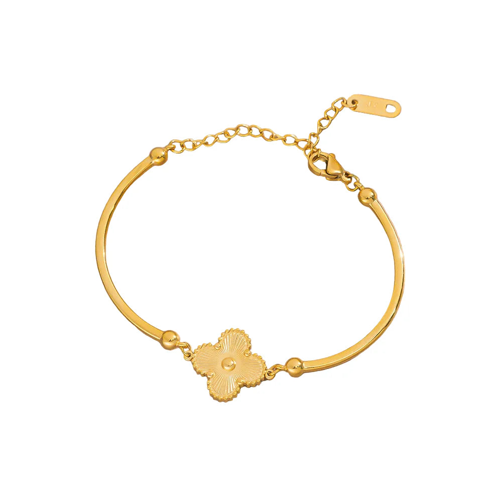 Culbreth's Jewelers Gold Clover Structured Bangle on wrist