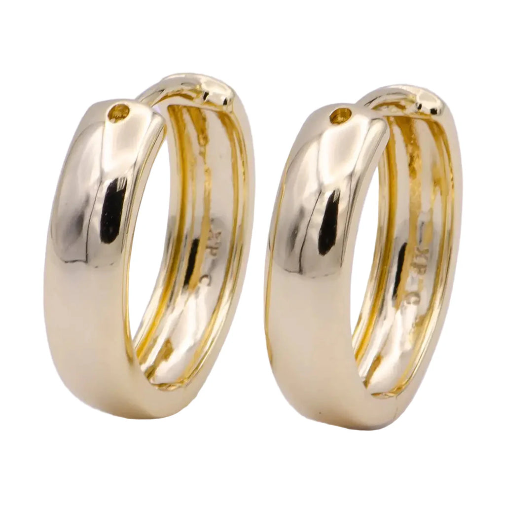 Culbreth's Jewelers rounded gold huggie hoop earrings with 24K gold plating on display