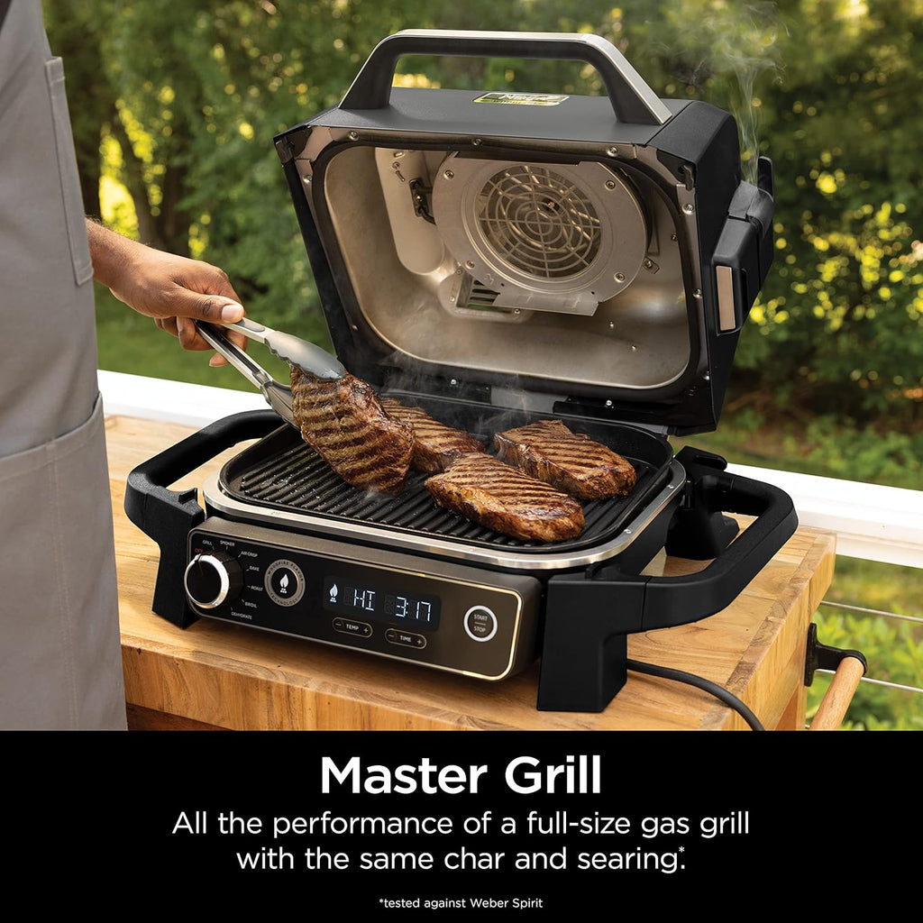 Ninja | Woodfire Series | 7-in-1 (Grill  BBQ  Roast  Air Fry  Dehydrate  Broil  Smoke) | Portable & Weather Resistant | Cook Up To 6 Steaks & 30 Hot Dogs | Woodfire Pellets included | OG701